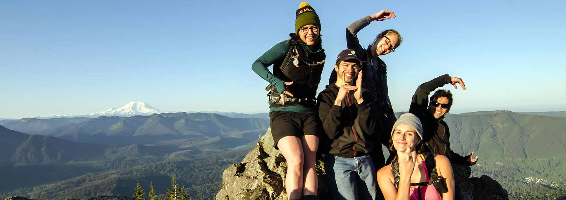 Biggins lab members on top of a mountain