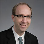 Portarit of Colin Pritchard, MD, PhD.