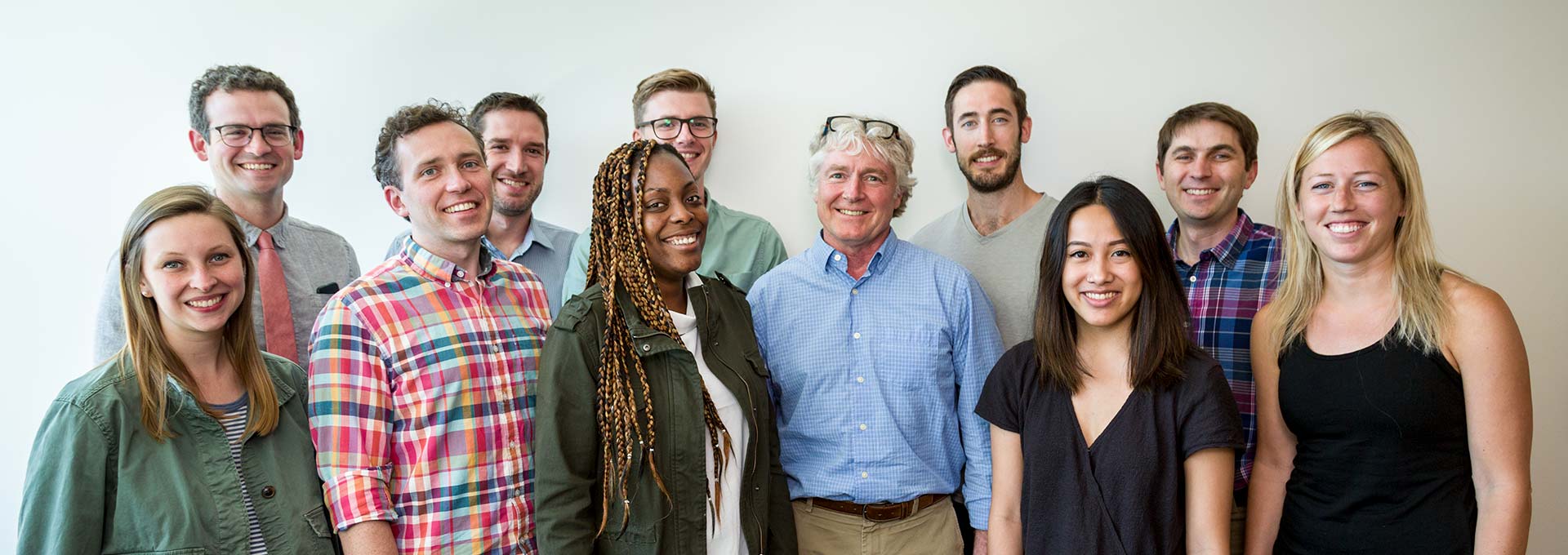 Kublin Lab posing happily at a lab meeting.