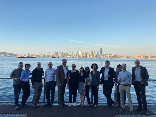 Group photo overlooking Seattle skyline