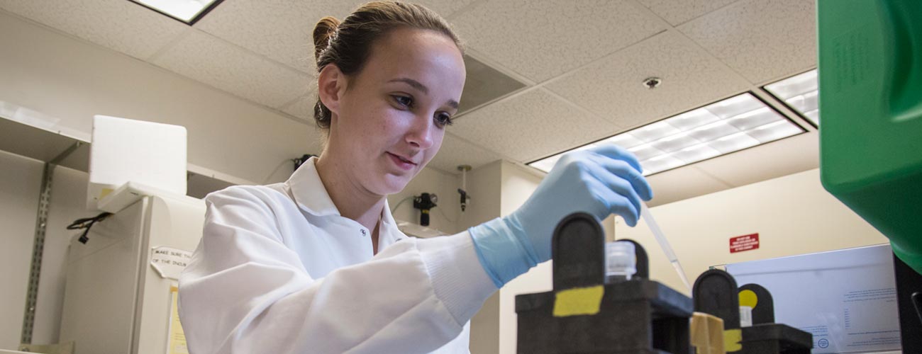 Researcher working in J Lee Nelson Lab